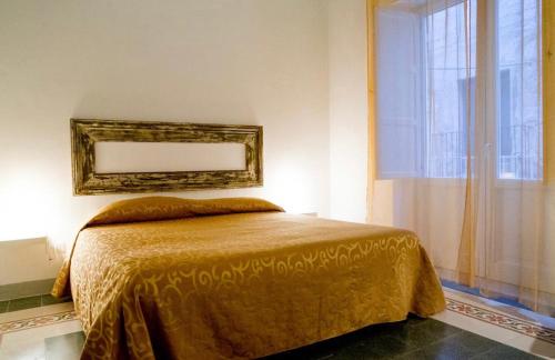 Postel nebo postele na pokoji v ubytování Angelo Apartments & Rooms