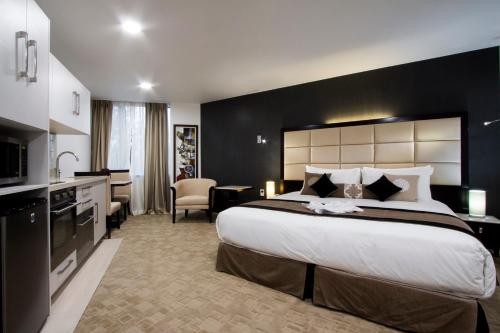 Kuchyň nebo kuchyňský kout v ubytování VR Queen Street Hotel & Suites
