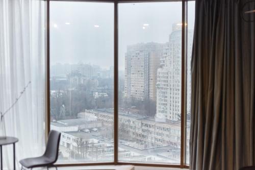 a view of a city from a hotel window at Stixiya in Odesa