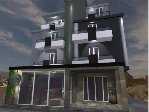 a rendering of a black building with windows at Meg Lifestyle Hotel & Apartaments in Riccione