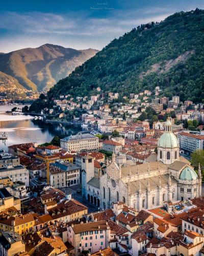 an aerial view of a city with a river and buildings at Villino Carla in Lipomo