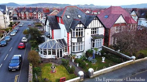 an aerial view of a large house on a city street at The Epperstone in Llandudno