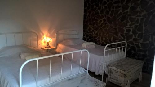 Postel nebo postele na pokoji v ubytování Espaço Pinguim