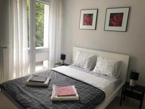 Postel nebo postele na pokoji v ubytování Apartament w kamienicy Gdynia