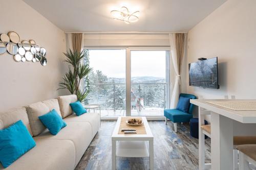 Ruang duduk di Apartman M Zlatni breg