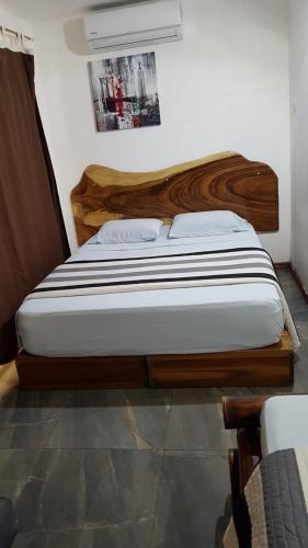 Una cama o camas en una habitación de Hotel Bugabutik