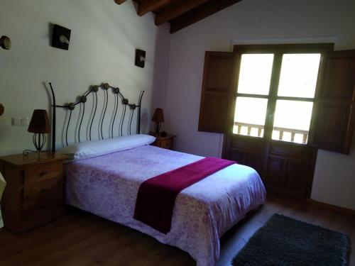 Katil atau katil-katil dalam bilik di Casa Llayo