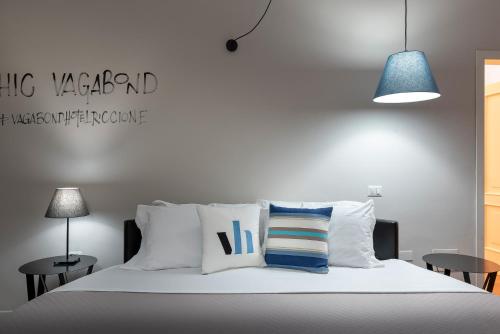 Postel nebo postele na pokoji v ubytování Hotel Vagabond