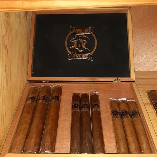 a box of cigars sitting on top of a table at Villa Rosa in Punta Rucia