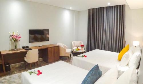 Televisyen dan/atau pusat hiburan di PHU THANG GRAND HOTEL