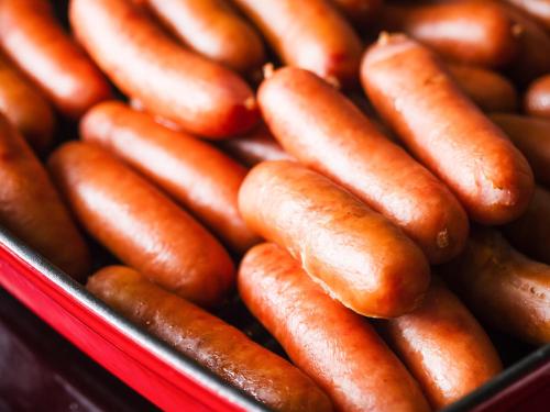 a pile of sausages in a red tray at Hotel Area One Ise Inter in Ise