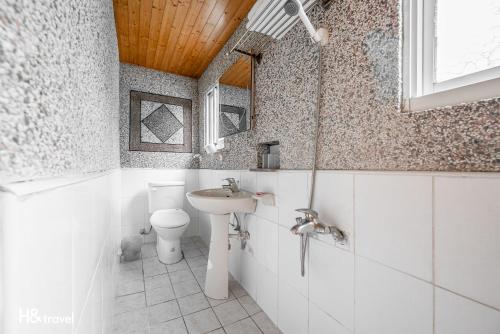 Koupelna v ubytování Shan Tyi Homestay