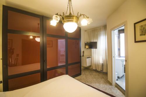a bedroom with a large sliding glass door at B&B Luxury in Lecce