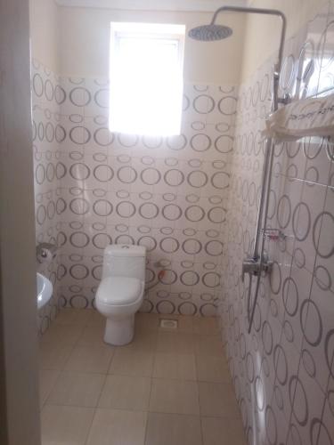 Ein Badezimmer in der Unterkunft Dich Comfort Hotel University Branch