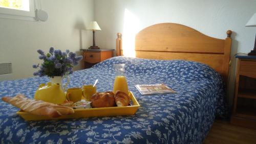 Postel nebo postele na pokoji v ubytování Goélia Résidence du Golf de l'Océan