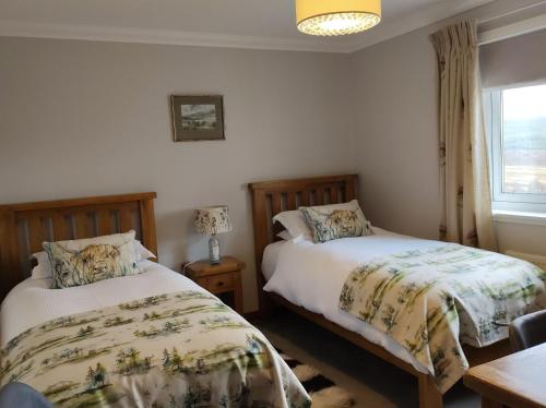 Ένα ή περισσότερα κρεβάτια σε δωμάτιο στο B&B Ronan House