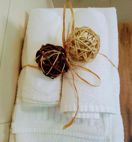 a pile of white towels with a nest on them at CASA RURAL Urruska in Elizondo