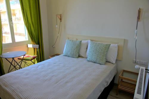 Postel nebo postele na pokoji v ubytování Hotel Elandra