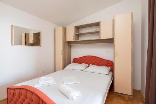 Postel nebo postele na pokoji v ubytování Adriatic Beach Suites