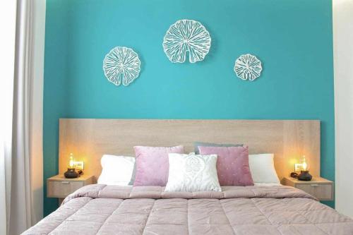 Giường trong phòng chung tại Ocean Garden suite 008 con jardín privado