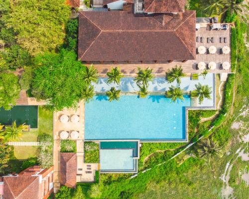 an overhead view of a house with a swimming pool at Alila Diwa Goa - A Hyatt Brand in Majorda