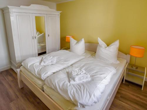Postel nebo postele na pokoji v ubytování Villa Binz - Apt. 01