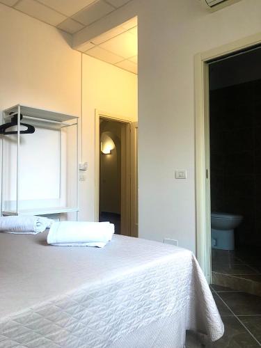 Letto o letti in una camera di Hotel Nazionale