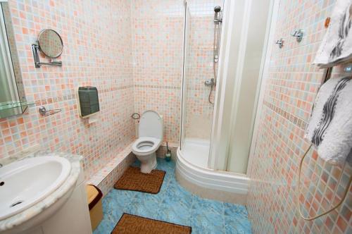 Ванная комната в Viva Hotel