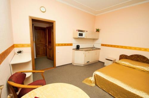 Kuchyň nebo kuchyňský kout v ubytování Viva Hotel