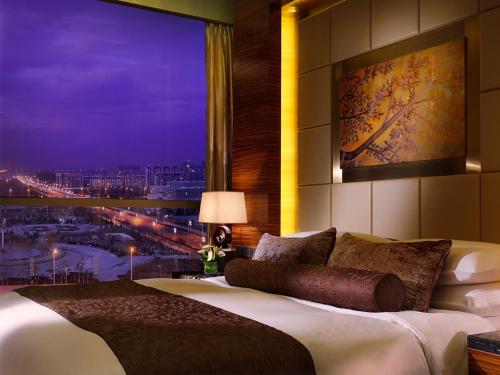 Katil atau katil-katil dalam bilik di Kempinski Hotel Yinchuan