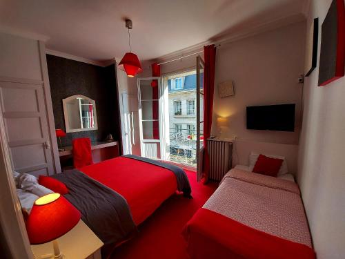 Кровать или кровати в номере Hotel Mondial