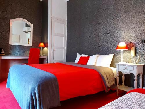 Кровать или кровати в номере Hotel Mondial