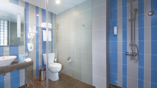 Ένα μπάνιο στο Holiday Inn Express - Qingdao West Coast by IHG