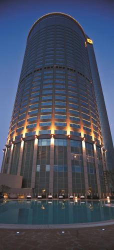 a large building with a pool in front of it at Shangri-La Far Eastern Tainan in Tainan