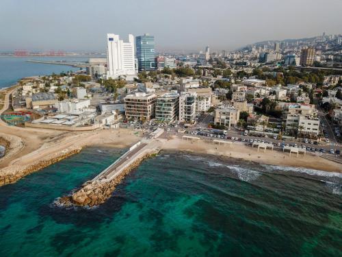 an aerial view of a beach and the ocean at Dream Penthouse in Haifa
