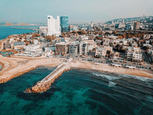 an aerial view of a beach and a city at Dream Penthouse in Haifa