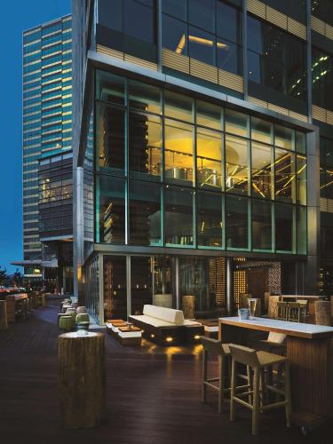 a large building with a couch in front of it at Kerry Hotel Pudong, Shanghai - Indoor Connecting to Shanghai New International Expo Centre in Shanghai
