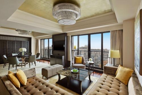 a living room with a couch and a table at Midtown Shangri-La, Hangzhou - around 5 minutes walking distance to West Lake in Hangzhou