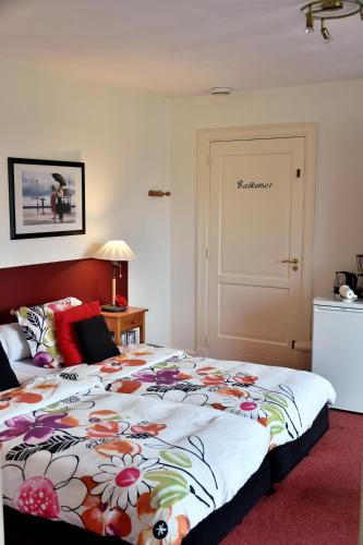 Postel nebo postele na pokoji v ubytování B&B De Rozenhorst