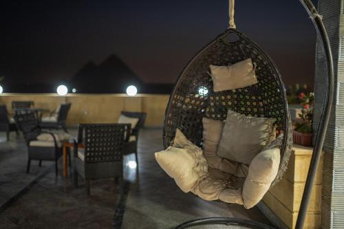Coin salon dans l'établissement Gardenia Pyramids View Inn - Rooftop
