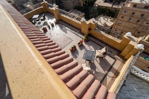 Balcon ou terrasse dans l'établissement Gardenia Pyramids View Inn - Rooftop