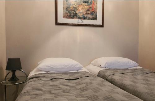 Voodi või voodid majutusasutuse Homely Apartment MILA toas