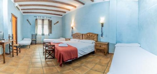 Postel nebo postele na pokoji v ubytování Hosteria Tierrallana by Juypehotel