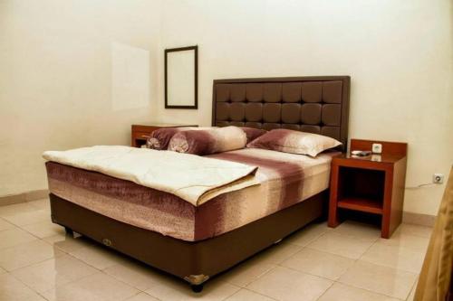 スラカルタにあるKartika Syariah Guest Houseのギャラリーの写真