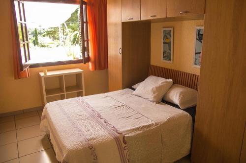Postel nebo postele na pokoji v ubytování Casita blanca con fibra óptica y piscina cominutaria
