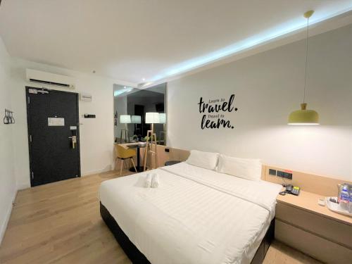 Krevet ili kreveti u jedinici u objektu Victoria Station Hotel Melaka
