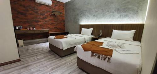 Postel nebo postele na pokoji v ubytování VISTA HOTEL