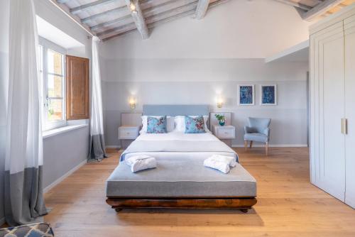 Ένα ή περισσότερα κρεβάτια σε δωμάτιο στο Relais Le Macine Di Stigliano