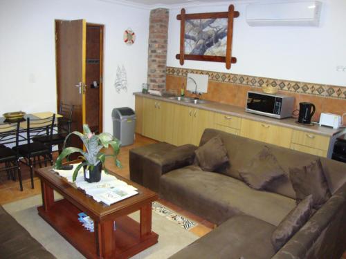 Zona d'estar a Trafalgar Chalets Unit 1