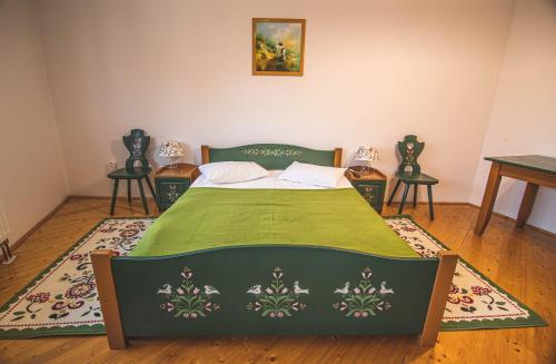 Postel nebo postele na pokoji v ubytování Amadé Pension & Restaurant